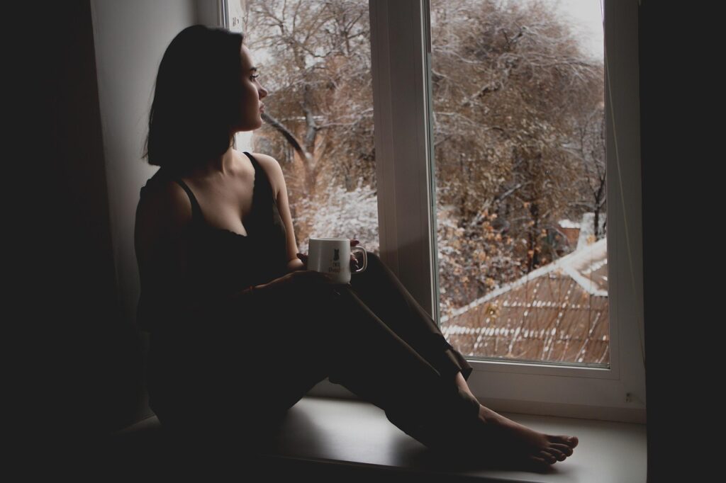 girl, window, sit, sitting, sad girl, wait, waiting, by the window, looking out, cup, mug, indoors, woman, model, sad, person, brunette, female, young woman, thinking, lady, depression, melancholy, tired-5801502.jpg